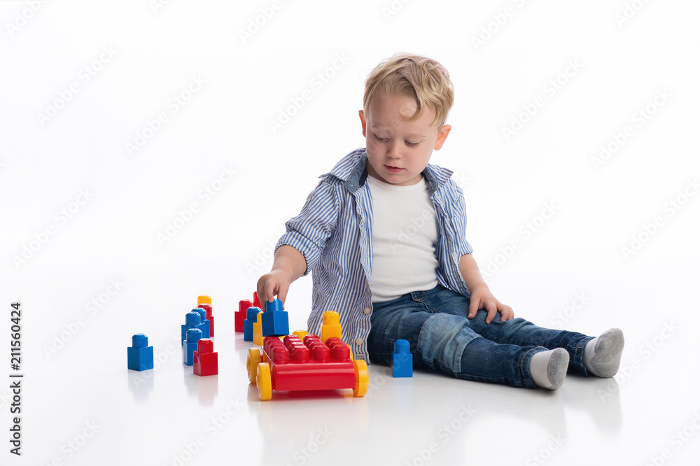 Boy Playing with Building Blocks Boy Playing with Building Blocks