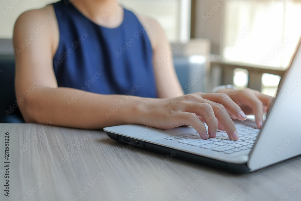 Businesswoman using laptop for analysis maketing plan, Manager calculate financial report and graph chart. Business, Finance and Accounting concepts Businesswoman using laptop for analysis maketing plan, Manager calculate financial report and graph chart. Business, Finance and Accounting concepts
