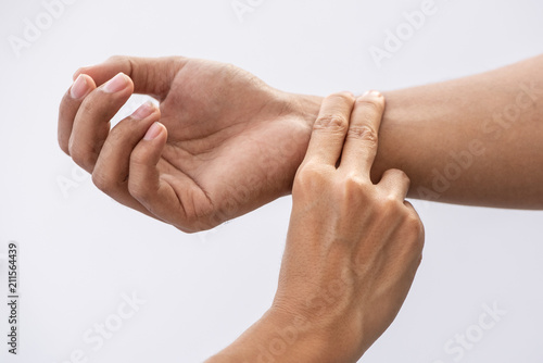 Take wrist pulse,  Traditional Chinese medicine checking pulse, information of the condition of the internal organs, reflects the state of Qi (energy) and blood in the body. 