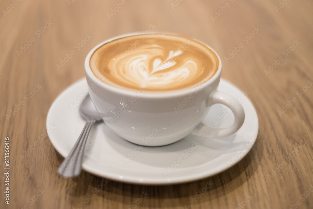 Latte coffee on the wood table. Latte coffee on the wood table.