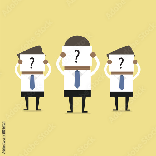 African businessman hold signs with question marks, as yet unable to determine who they are.