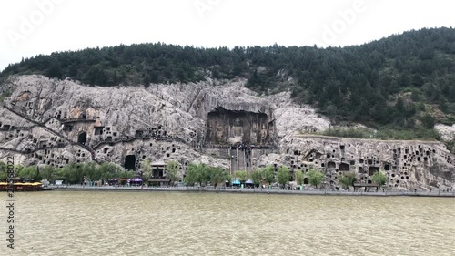 Panning view of the Longmen Grottoes in Luoyang, China