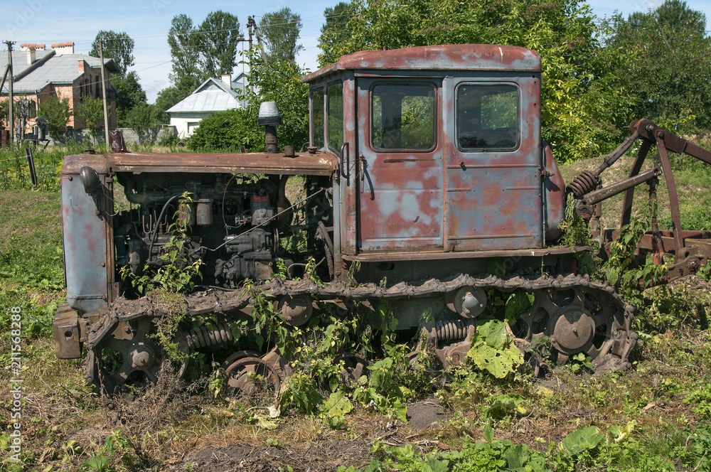 Old rusty crawler tractor