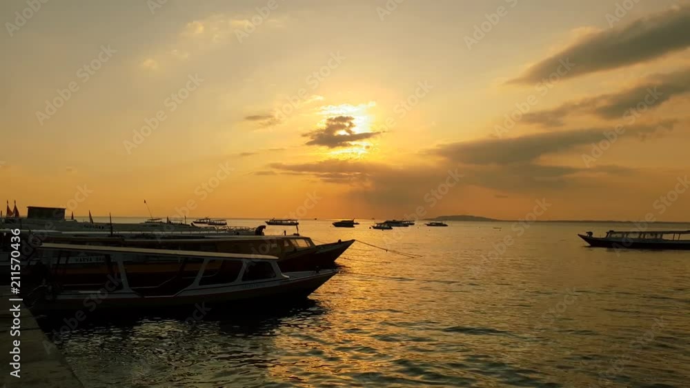 Sunset at a pier with boats. Sunset at a pier with boats.