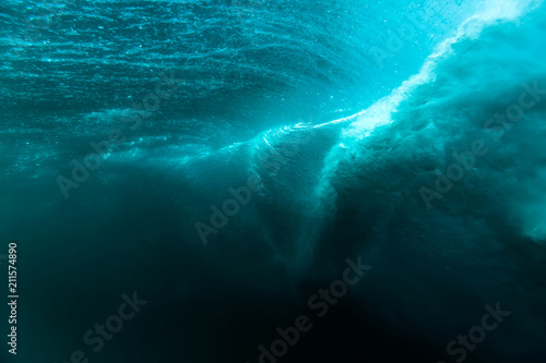 Barrel wave is underwater. Blue ocean in underwater