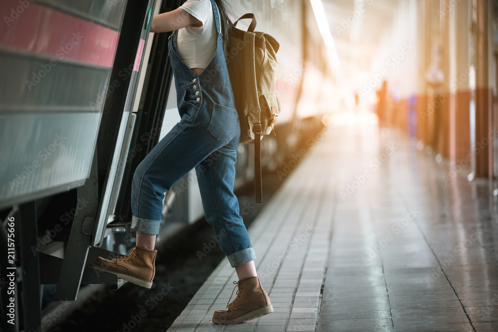 Girl traveling the tourist train station, Active and travel lifestyle concept