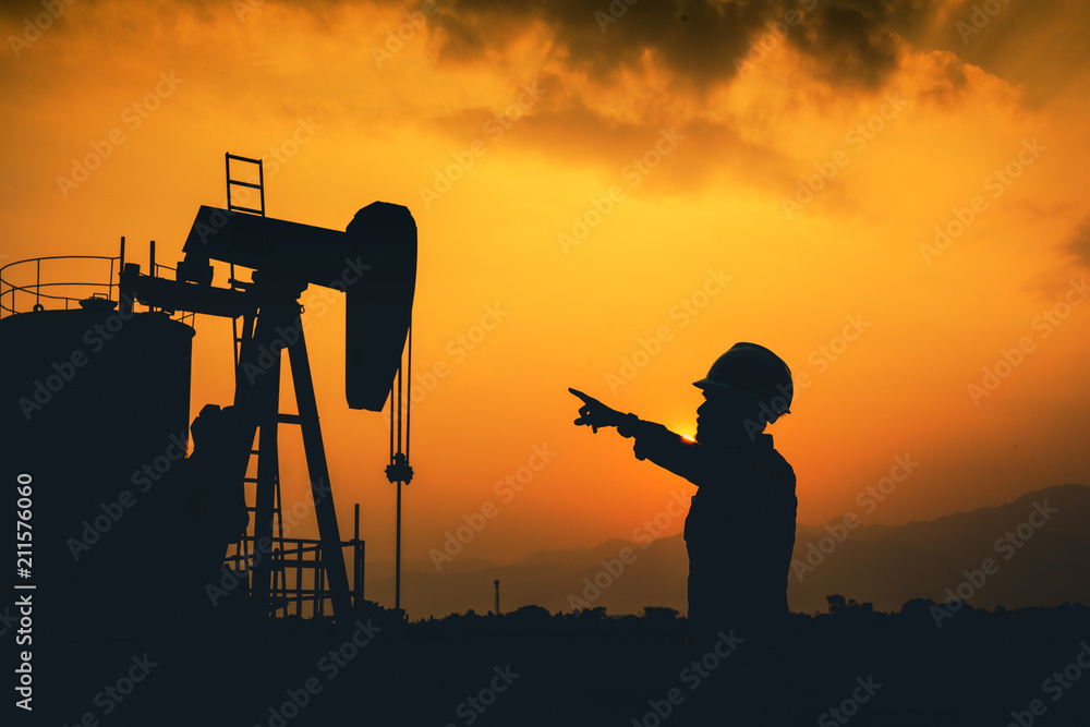 Engineers and Oilfields.Oil drilling exploration. Silhouette.