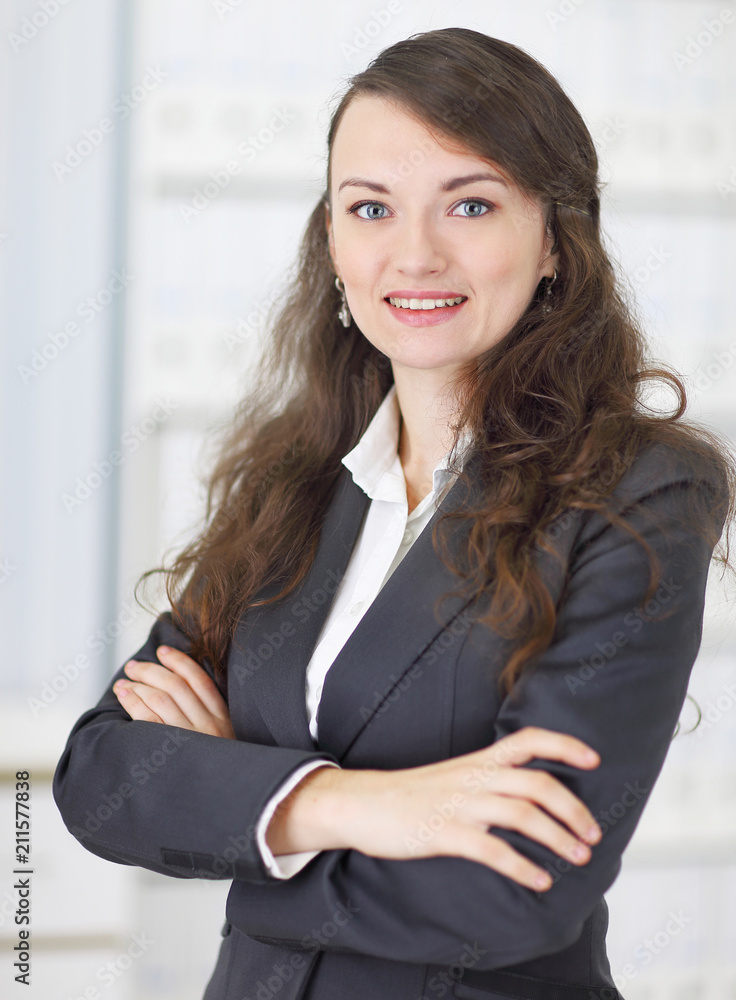 portrait of young business woman on the background of the office portrait of young business woman on the background of the office