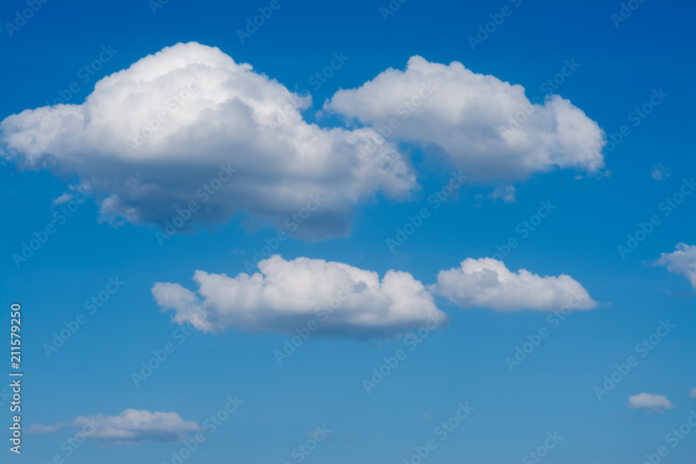 White clouds on the blue sky.
White clouds on the blue sky.