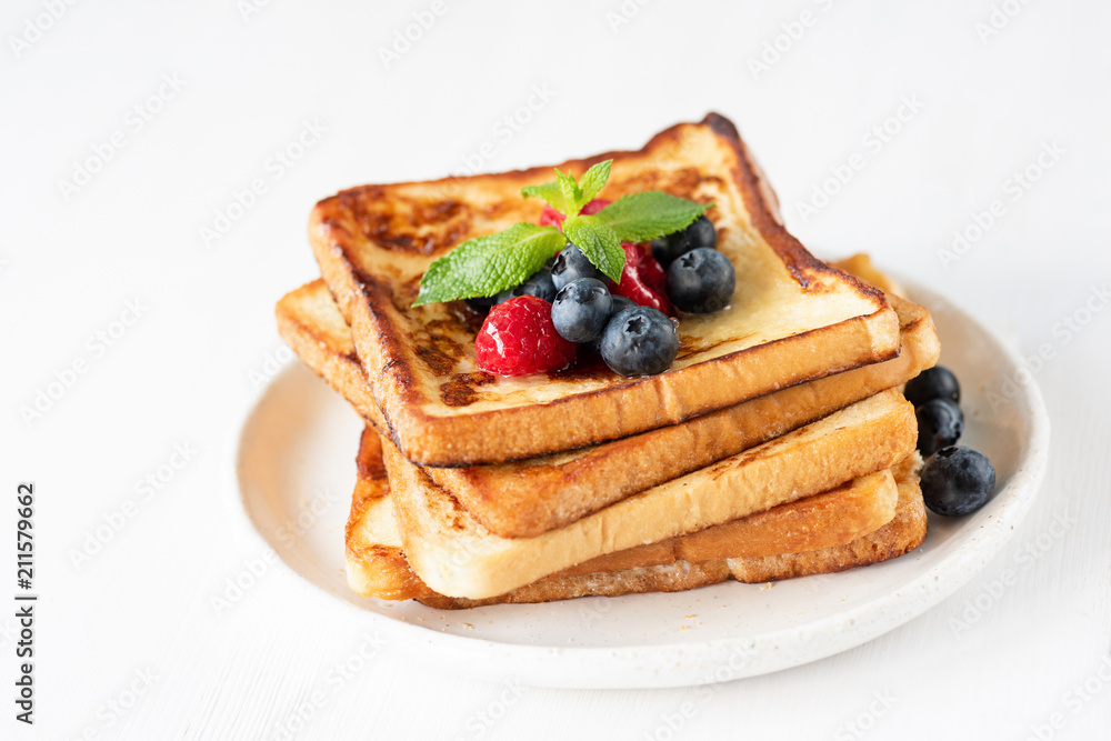 French toast with berries isolated on white. Closeup view, selective focus - obrazy, fototapety, plakaty 