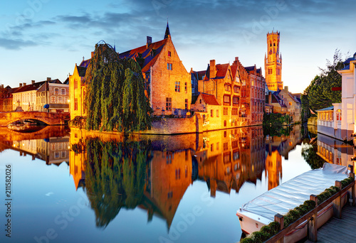 Belgium - Historical centre of Bruges river view. Old Brugge buildings reflecting in water canal.