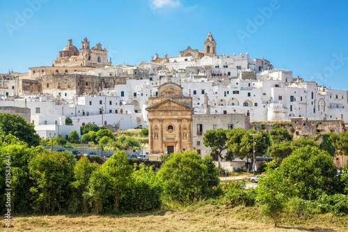 Panoramic view of Ostuni white town, Brindisi, Puglia (Apulia), Italy, Europe. Old Town is Ostuni's citadel. Ostuni is referred to as the White Town. Architecture and landmark of Italy. photo