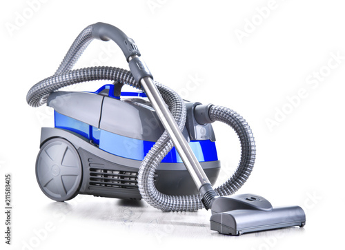 Canister vacuum cleaner for home use isolated on white