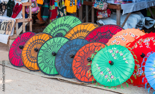 Multi-colored umbrellas in the local market in Bagan  Myanmar. Copy space for text.