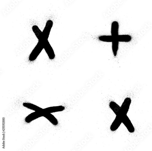 graffiti cross plus x sign sprayed in black on white