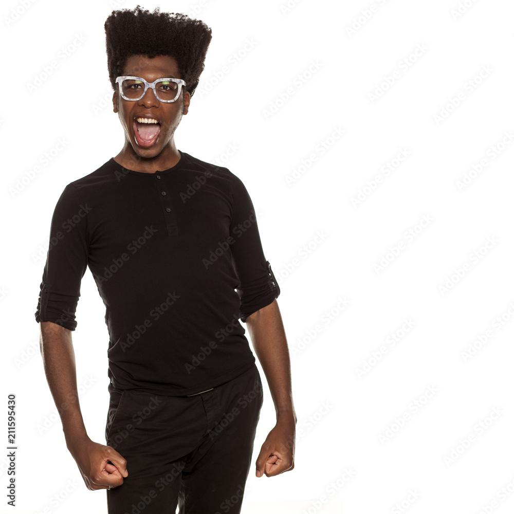 Fototapeta premium happy young handsome afro american hipster guy isolated on white background. people emotions concept