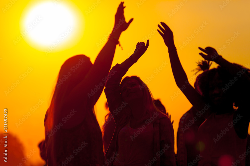 Sunset party dancers silhouettes at summer music festival - obrazy, fototapety, plakaty 