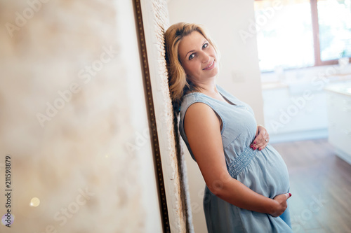 Beautiful blond pregnant woman