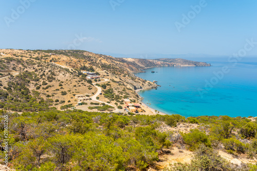 View direction north-east coast to the beach of Korfos with guest house and tavernas photo