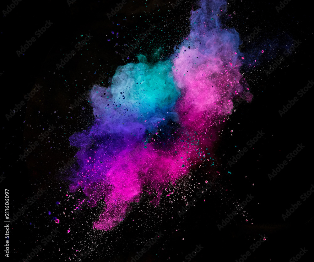 Fototapeta Colored powder explosion isolated on black background.