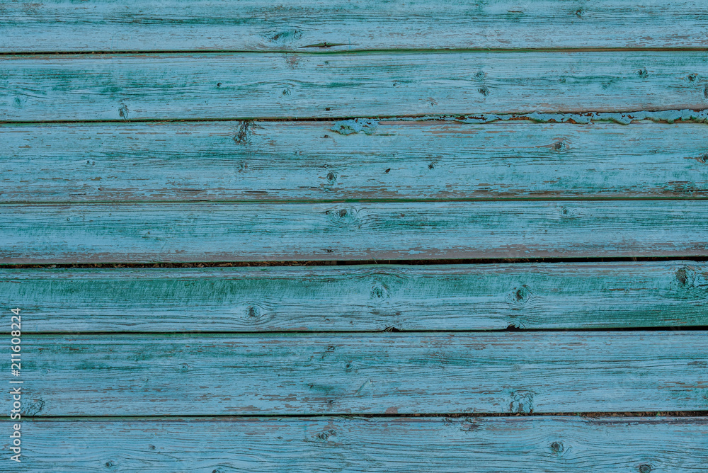 Obraz premium Grunge wooden background - old boards painted in blue color