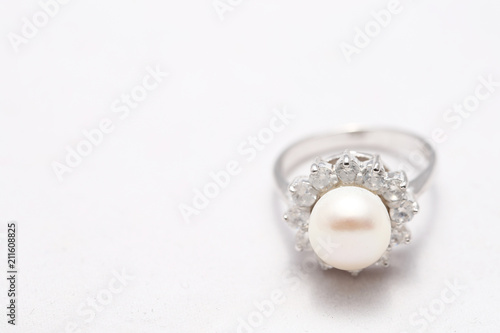 Pearl on diamond ring