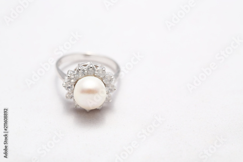 Pearl on diamond ring