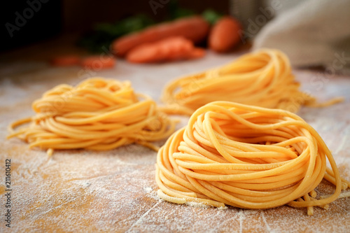 fresh spaghetti nests with carrots