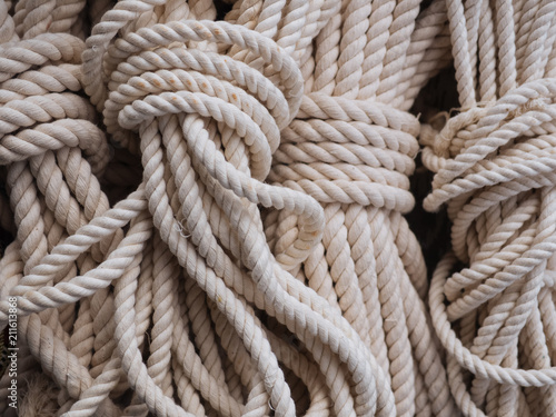 Stacks of white ropes in close-up