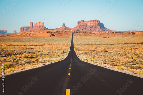 Classic highway view in Monument Valley at sunset, USA