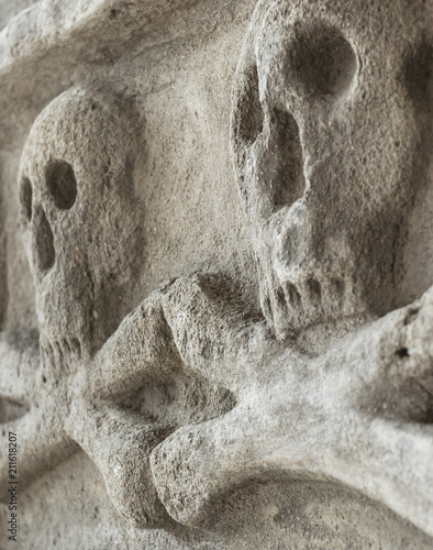 Crossbones carved in a tombstone