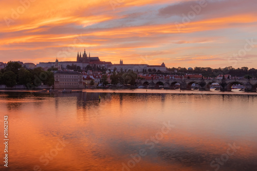 The View on Prague gothic Castle with Charles Bridge after the sunset  Czech Republic - Beautiful reflections of Vltava river