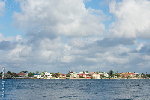 Expensive waterfront homes in St. Petersburg, Florida, sky with clouds.