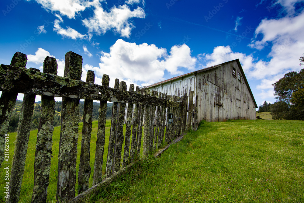 Fence leading to barn