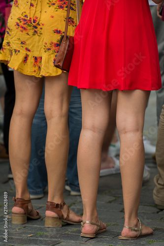 Two sexy women's legs. Close up.