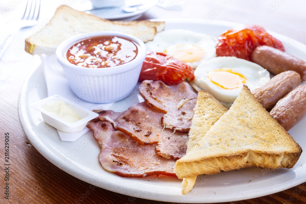 Egg and Toast - classical english breakfast with egg and ham Stock