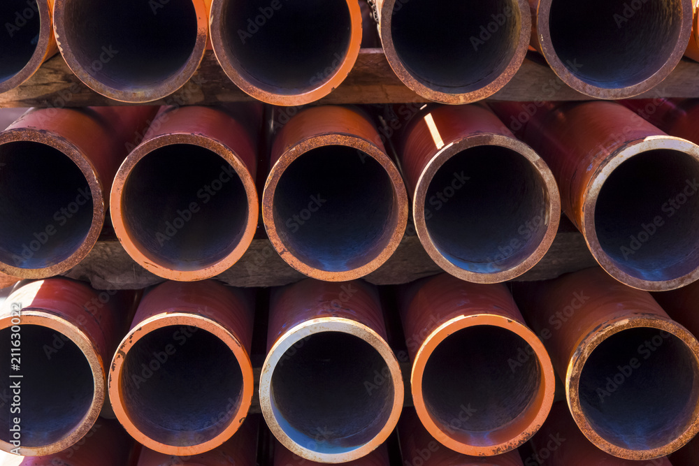orange sewer pipes, background image close-up orange sewer pipes, background image close-up