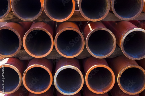 orange sewer pipes, background image close-up