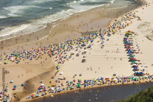 Guarda do Embau beach in the summer crowded with tourists, aerial view - Santa Catarina, Brazil © Helissa