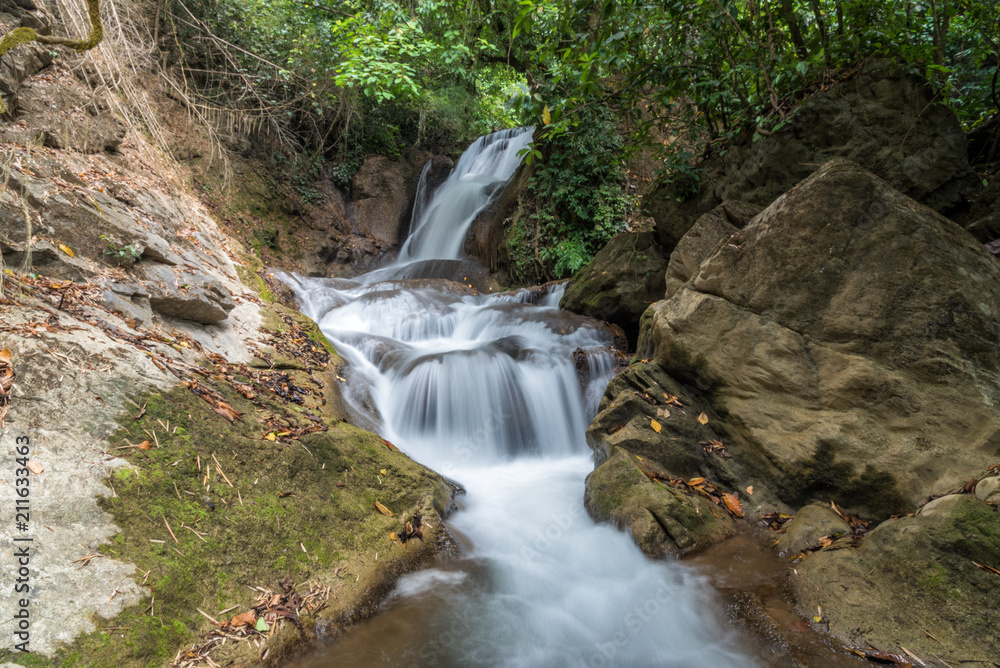 Pha-Tak waterfall in deep rain forest at Khao Laem National park, Kanchanaburi, Thailand.