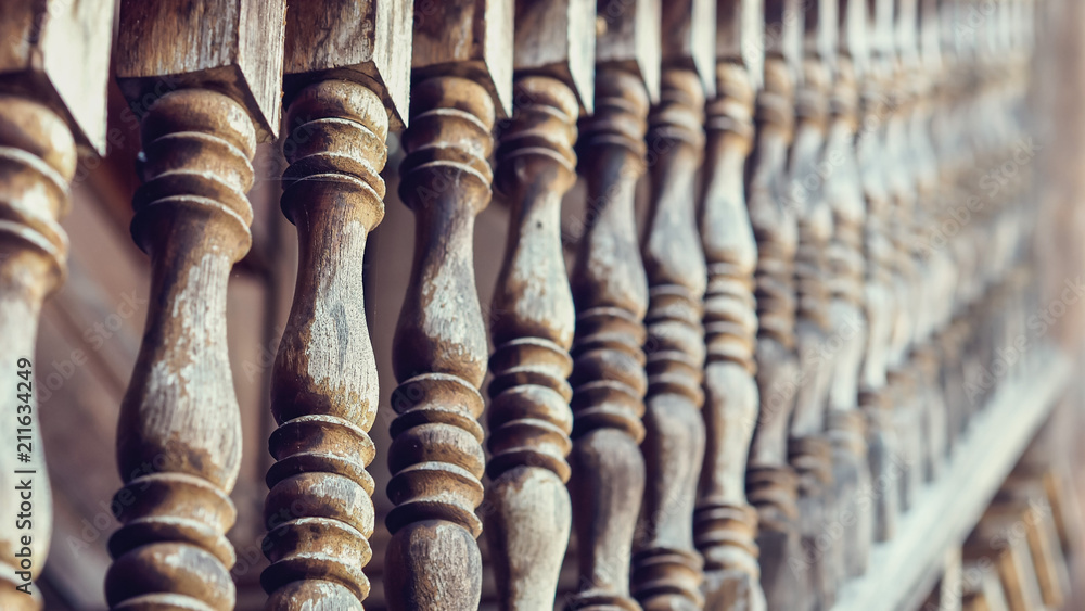 Closeup Shot of Natural Teak Wood Balustrades, Banisters or Railing (Selective Focus and Blurred Background).