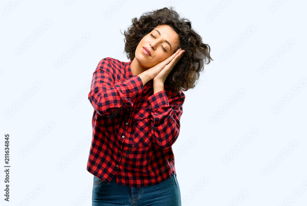 Beautiful arab woman tired and bored, tired because of a long day overworking Beautiful arab woman tired and bored, tired because of a long day overworking