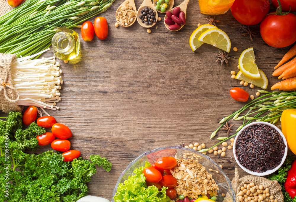 Healthy food background ,fruits and vegetables with salad bowl on wooden table. Healthy food background ,fruits and vegetables with salad bowl on wooden table.