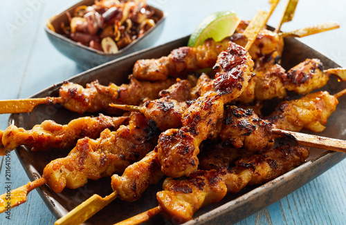 Spicy satay skewers with grilled meat