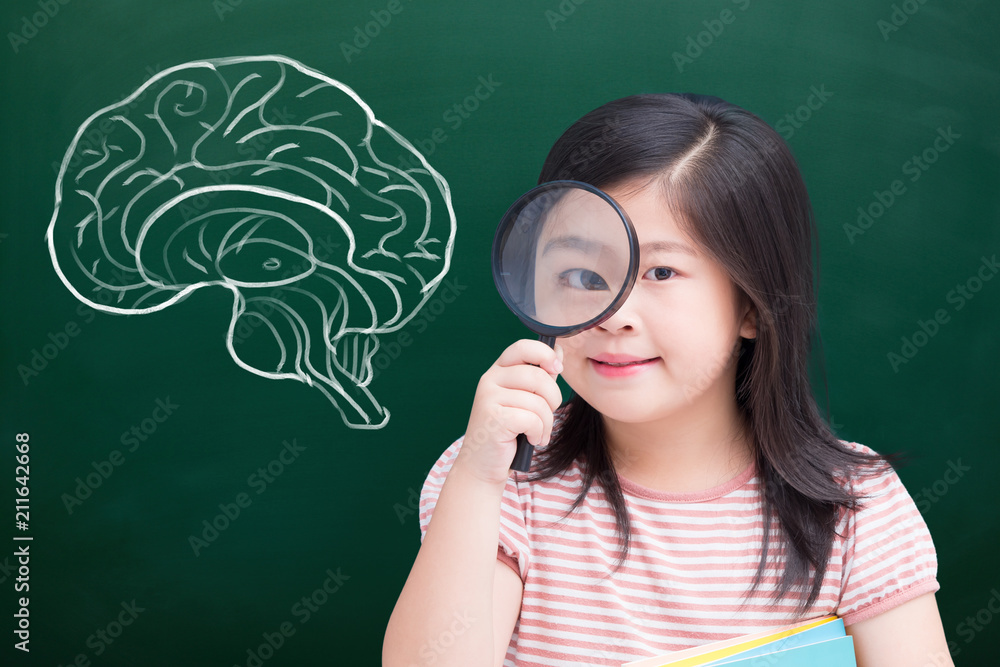 girl take magnifying with brain