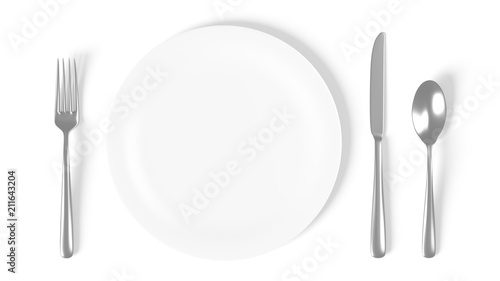 Plate isolated on white with fork, knife and spoon