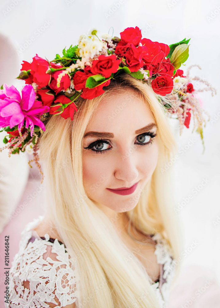 Cute girl in a colored wreath Cute girl in a colored wreath