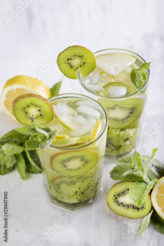 cocktail with kiwi, lemon and mint