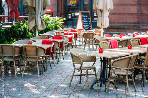 Empty street cafe, early morning, Hackescher Markt, Berlin, Germany