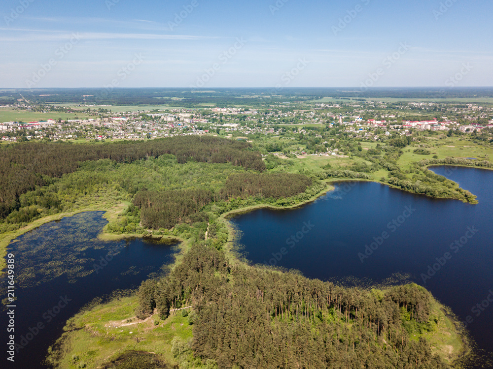 Fototapeta premium Beautiful aerial view of blue lakes and forest